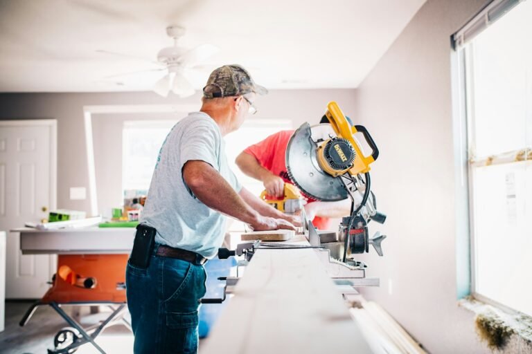Contractor reviewing renovation plans on a job site in New York City